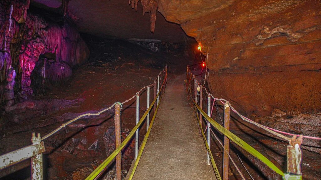 Entrance to historic Shawnee Cave on 9.72 acres in Valley Springs AR
